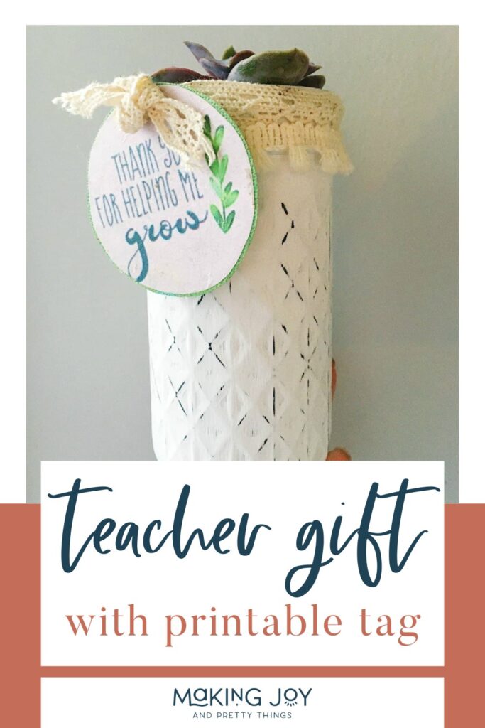 Mason jar painted white with succulent in it with a printable tag that says thank you for helping me grow for teacher gift